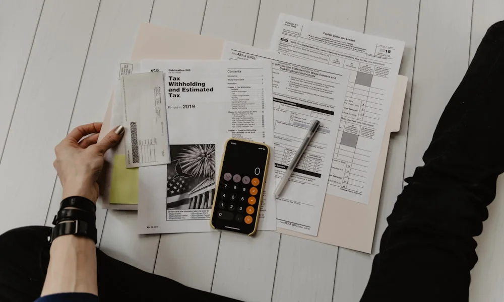 Mockup of a digital banking transaction ledger showing dates, descriptions, and amounts
